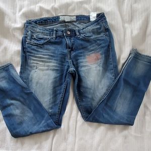 Cropped, distressed, patchwork jeans